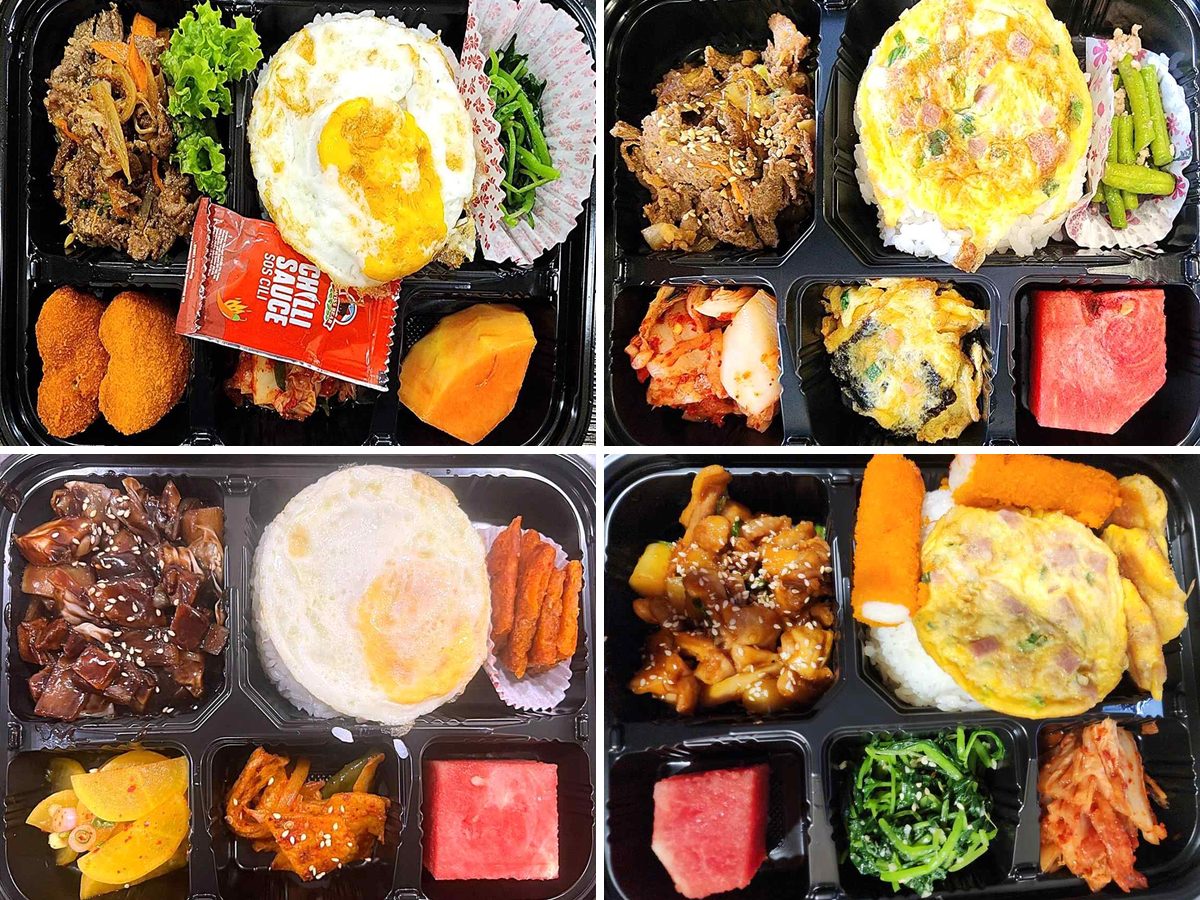 밥과 계란, 불고기, 김치, 나물, 과일이 칸마다 담긴 EEC 점심 도시락 네 개
